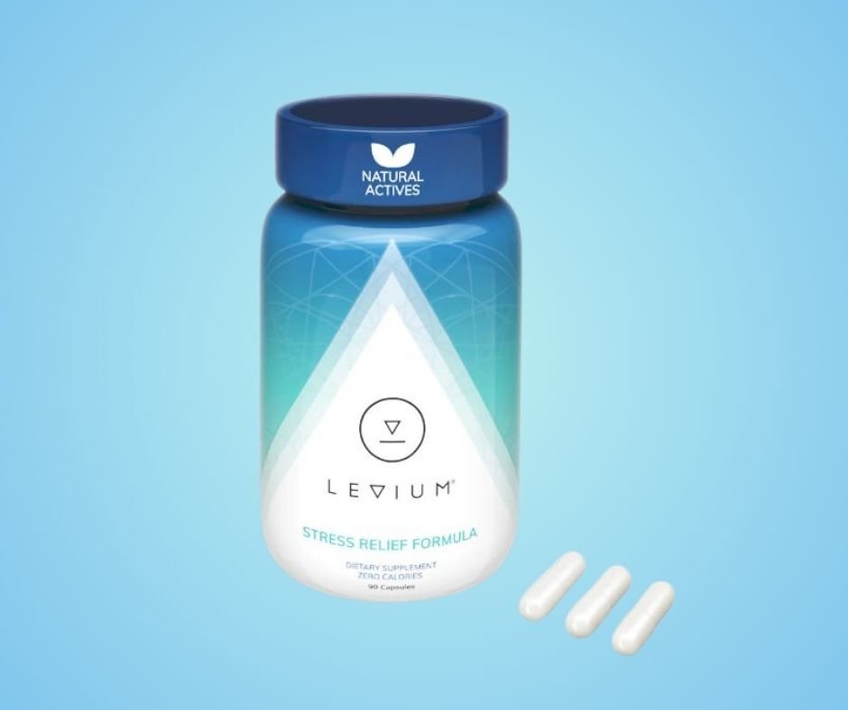 Bottle of Levium Stress Relief Formula capsules, a natural dietary supplement for stress relief, displayed with three white capsules next to it on a light blue background.